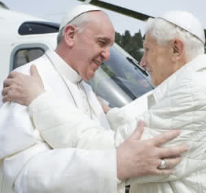 Caption: Pope Francis embraces retired Pope Benedict XVI at the papal summer residence in Castel Gandolfo, Italy, March 23. Pope Francis traveled by helicopter from the Vatican to Castel Gandolfo for a private meeting with the retired pontiff. (CNS/L'Osservatore Romano via Reuters)